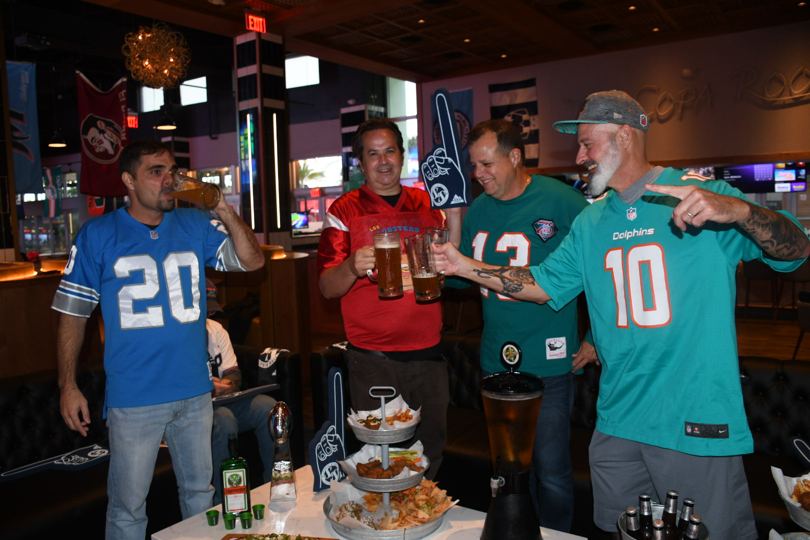 a fantasy football league celebrates the start of their fantasy football season