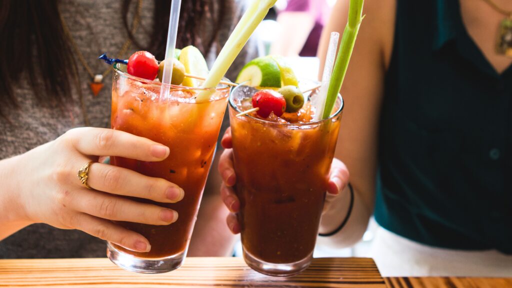 Bloody Mary and diners cheering at Brunch