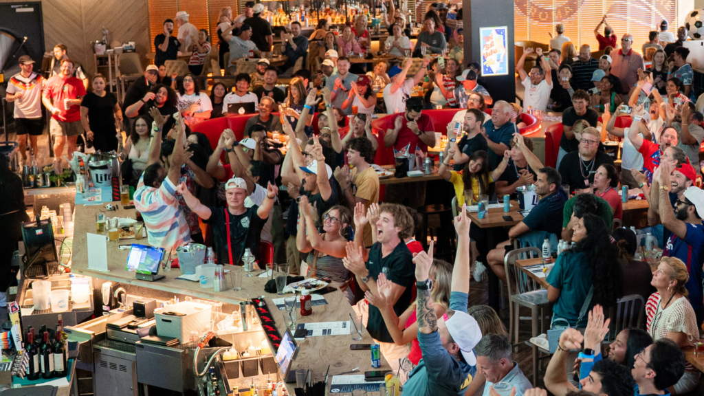 Fans celebrating World Soccer at Sports and Social