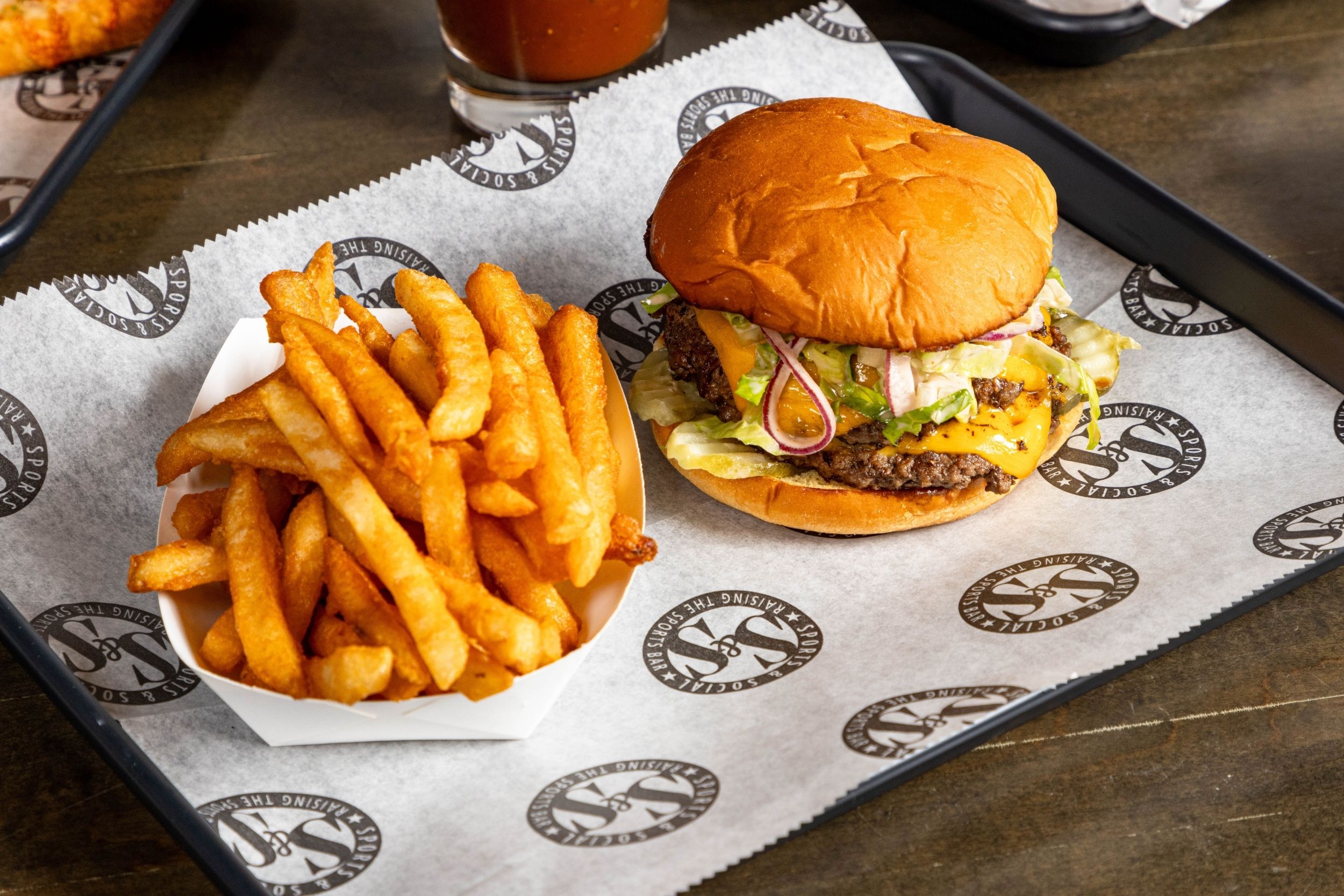 Bacon Onion Smash Burger at Sports and Social