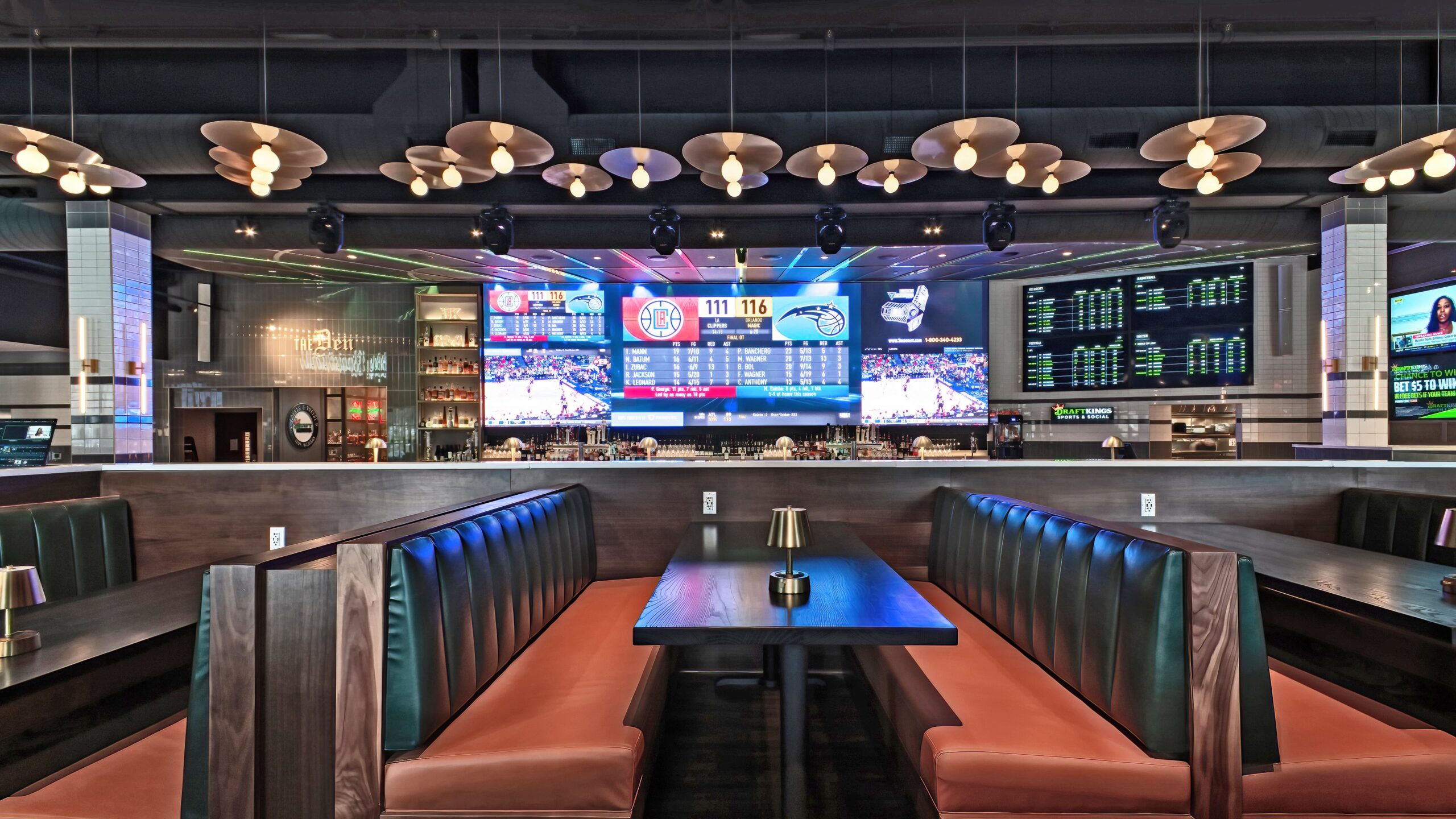 Draftkings Sports & Social rendering with full bar, TV screens, and booth seating.
