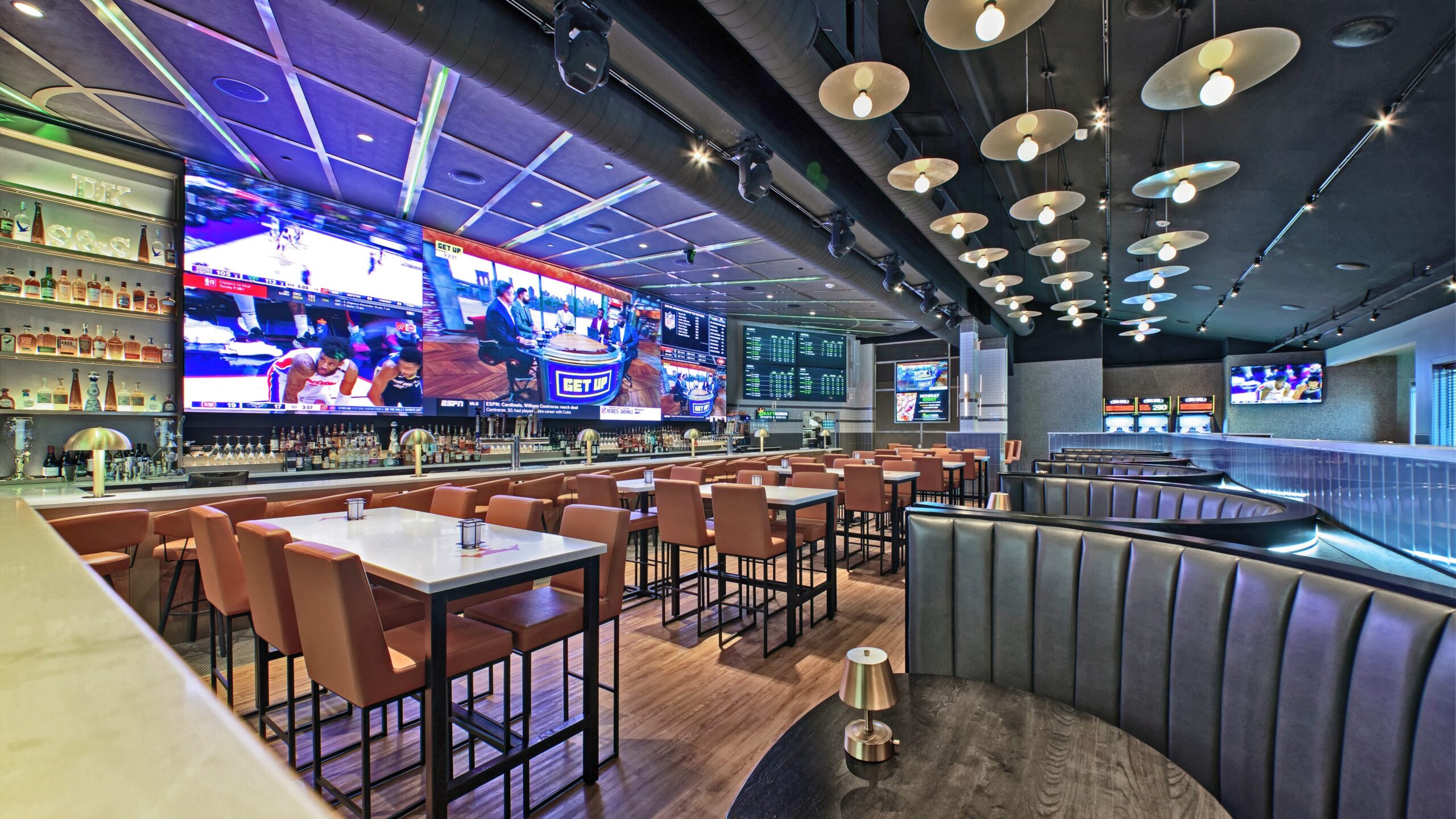 Draftkings Sports & Social Nashville Live! main bar rendering with media wall and tables.