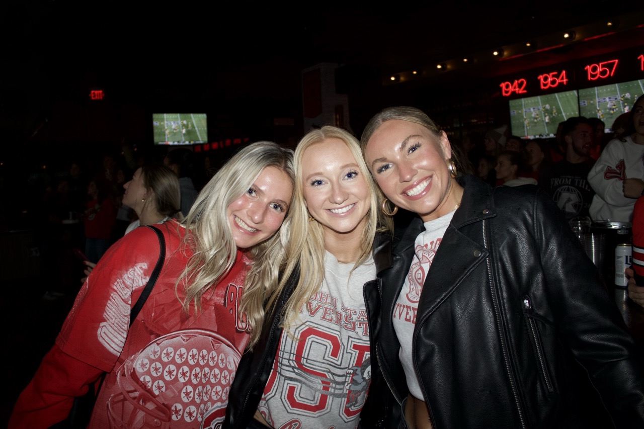 three women at Sports & Social sports bar enjoying nightlife.